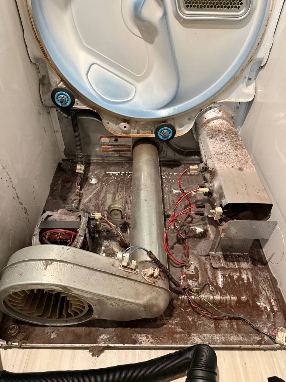 Dryer drum rollers and blower wheel inspection - Done Right Appliance Repair