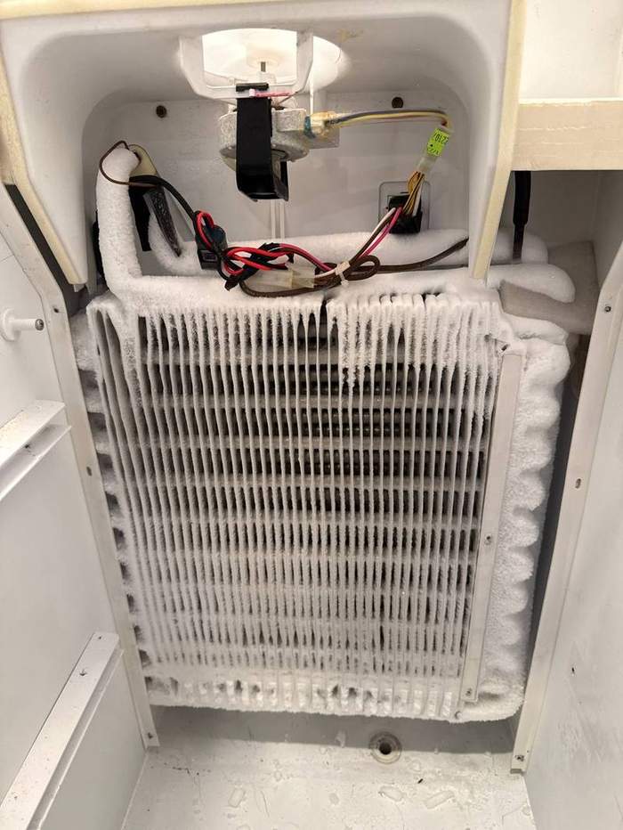 Frozen evaporator — defrost system failure
